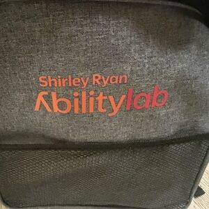 Abilitylab Shirley Ryan Gray Men’s Backpack - Gray with Orange Logo